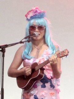 Alot of people I know really like Gabby LaLa.  When she is with Claypool and playing sitar and NO VOCALS I guess she is ok, but her solo act is pure torture.  But she is a little cutie, huh?