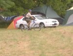 An ARMED cop spots me taking his picture and swoops in on me.  I play deaf and blind and ignore him pretending to take a panoramic photo and he gets tired of me and leaves.  Wakarusa 2006 will go down in the books as a legendary festival because of the constant harassment of the fans.  If the promotors don't fix this they are going to be running out of the money and won't have a festival.  I am pretty sure I won't go back.  If I do it will only be after a strongly worded statement from the promoters that this is NOT going to happen again.